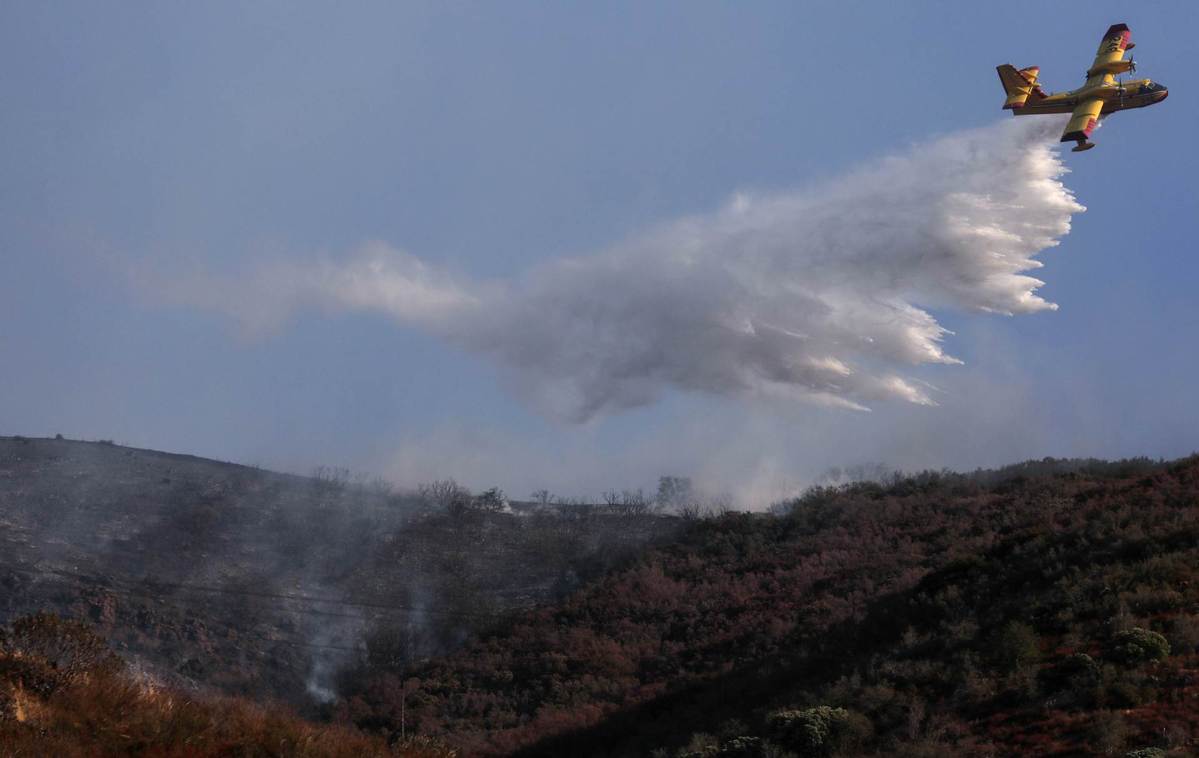 California wildfires burn 3.75 mln acres with 26 fatalities